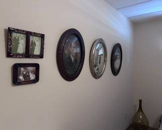 Antique framed portraits.