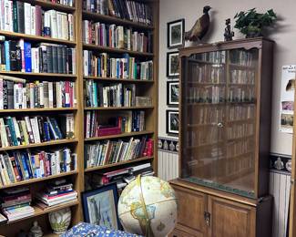 Books. Globes. Gun cabinet.