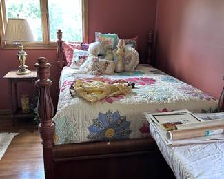 Full bed and quilts.