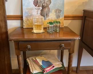 Side table. Barware. Placemats. Art.