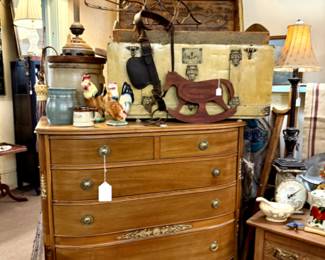 Vintage tall chest of drawers with unique carved details. Western detail decor.