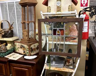 birdhouses, rustic garden shelf, stained glass window, Buffet, candlesticks.