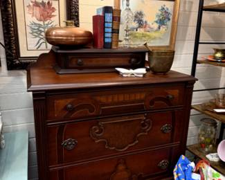 Vintage Art Noaveau highboy chest of drawers with glove box on top, copper bed warmer, vintage books, Vintage Cottage forest oil painting, Floral print.