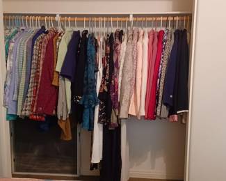 Ladies' suits; both slacks and skirt suits, jackets, dresses and formal dresses. Some brand new, never worn and with price tags still on them.