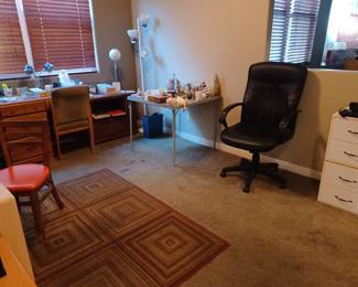 Desk, desk chair, chair, floor lamp, 2 desk lamps, office supplies, 4 drawer cabinet and many knickknacks. Card table also for sale.