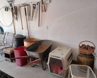 Airplane certified dog kennel, wheelbarrow, garden hose, tools, etc.