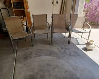 4 matching chairs and chicken plant pot.