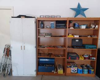 Many tools, seasonal decorations, men's shoes, 2 walkers, many other items too many to list.