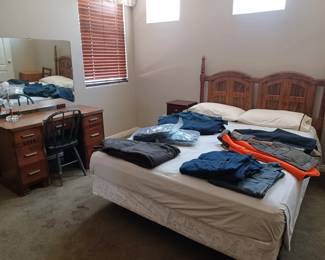 Men's work clothes. 3 full body coveralls for warm weather and a few full body coveralls for colder weather. 2 vests and a few work coats. Some of the coveralls are brand new still in the packages.