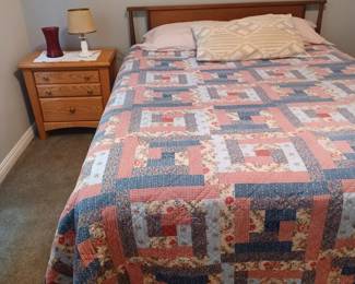 Queen size bed including mattress and box spring.