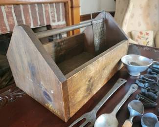 Vintage kitchen tools in wood caddy