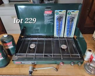 Coleman camp stove, propane and camp utensils