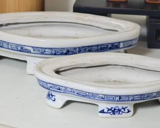 Blue and white shallow planters