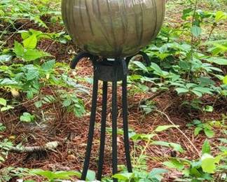 Glass orb on iron stand