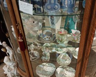 Curved glass curio cabinet
Shamrock cup with saucer
Wedgwood items