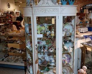 Curved glass curio cabinet