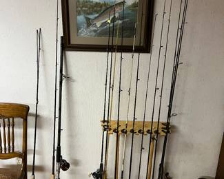 Large collection of fishing lures/tackle, rods, and accessories (hundreds of lures).