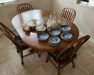 Dining table with two leaves by Tell City; two dining chairs by Richardson Brothers, and two chairs by Ethan Allen or similar.