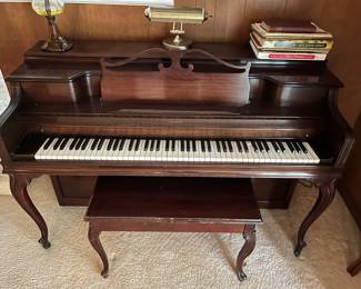 Upright piano by Janssen.