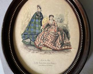 Antique fashion print in oval frame.