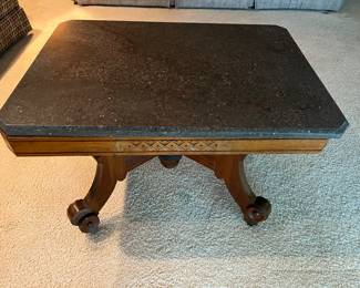 Eastlake coffee table with marble top.