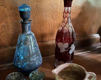 Bohemian ruby-to-clear glass decanter; vintage Venetian blue glass decanter with stopper and two glasses.