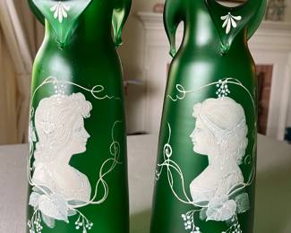 Two antique Mary Gregory (or similar) emerald glass vases.