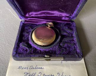 Early 20th-century pendant/pocket watch (1906), gold-plated, with provenance.