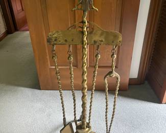 Antique ornate brass fireplace tools set.