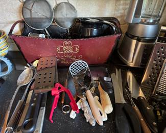 Assortment of Kitchen Knives and Utensils