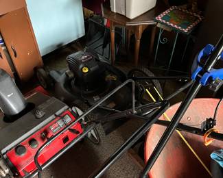 Lawn mower, snow blower, wheel barrow.