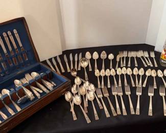 Silver Plate Flatware and Cartoon Drinking Glasses