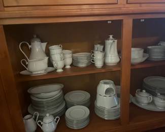 China with a simplistic and classy design - white with silver trim.