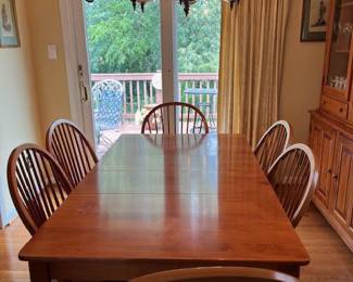 Hard rock maple dining table with 6 chairs and matching china cabinet and hutch; vintage hand-painted German chandelier; and window treatments