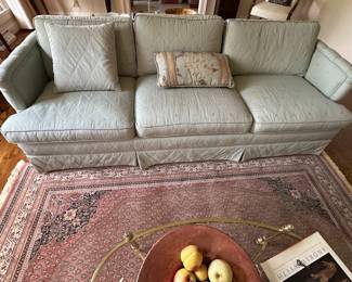 mid century sofa in muted Tiffany blue fabric, wood accent trim
