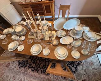 mid century style white with platinum band china with serving pieces, sugar bowl is missing, also a set of crystal with 23 pieces, champagne and wine