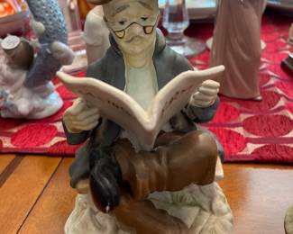 "Racing Form Man reading a newspaper" figurine