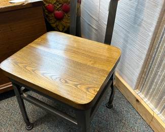 One of 8 steel and wood dining chairs, brand new.