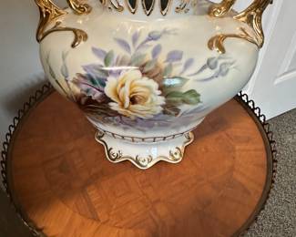 Circa 1950 vase with yellow roses.