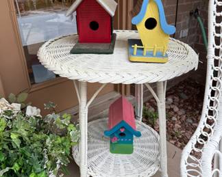 Wicker side table and collection of bird houses