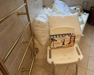 Shower chair and a pillow for all your guests!