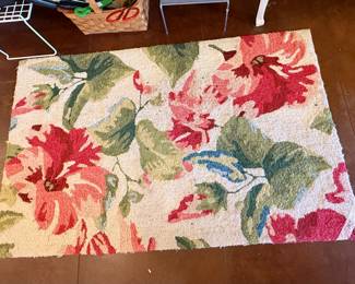 One of two matching kitchen throw rugs