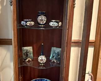 Small curio cabinet with some lovelies