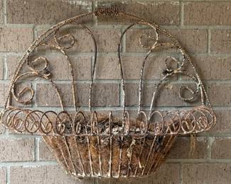 One of two matching “chippy paint” wall planters