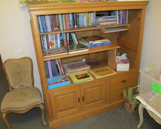 Nice selection of books and cabinet