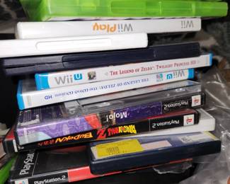 Assorted video games and DVD's