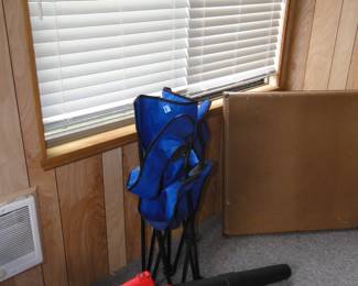 Folding chair, in the folded position