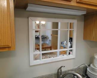 We like to call this little number, "Mirror over Sink"
