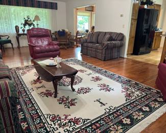 Large area rug and living room furniture
