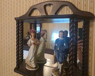 Antique shelf with mirror back & vintage ceramic couple